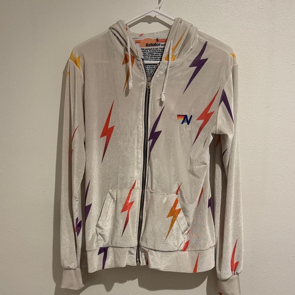 Aviator Nation Cream Zip Hoodie with Red, Purple, Orange & Yellow Bolts